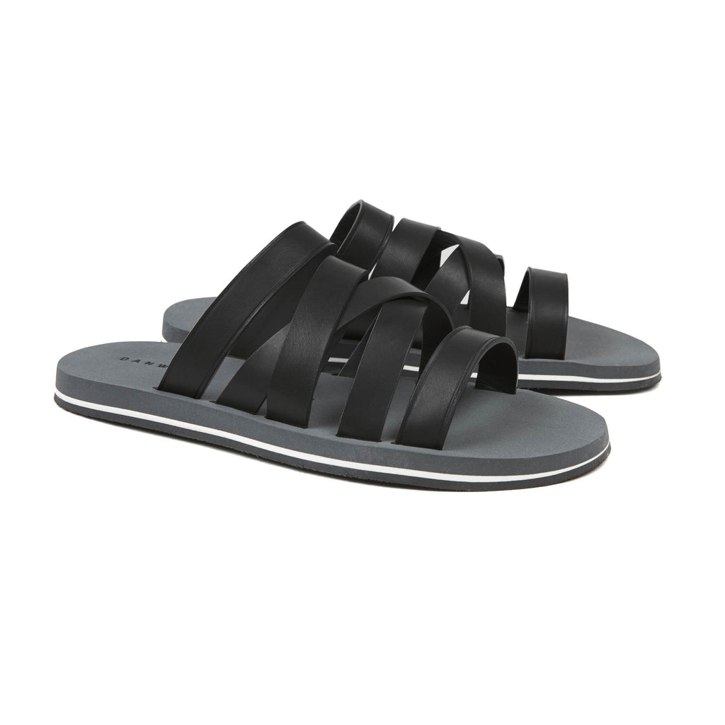 BLACK ASYMMETRICAL MULTI-STRAPPED LEATHER SANDAL WITH MICRO SOLE