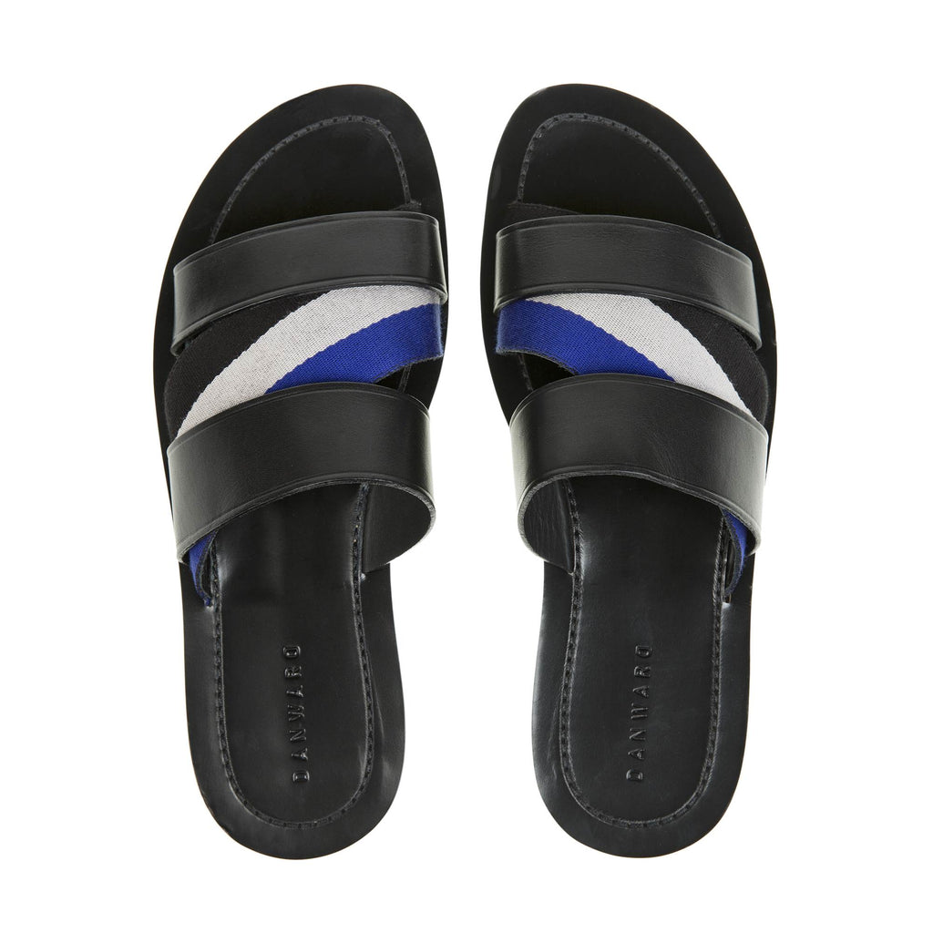 LEATHER SANDAL WITH ASYMMETRIC WEBBING AND HALF RUBBER SOLE