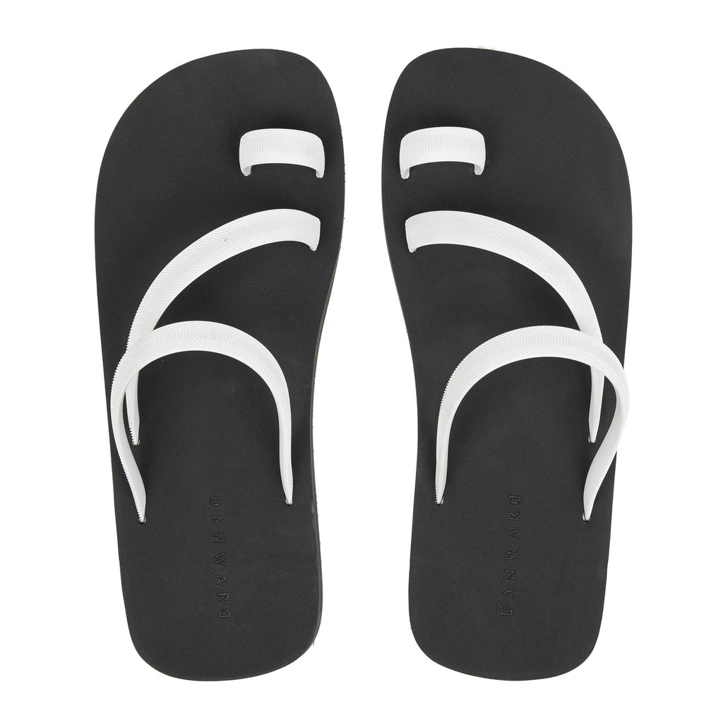 BICOLORED FLIP-FLOP WITH ASYMMETRIC CAGED UPPER,  BLACK WITH WHITE